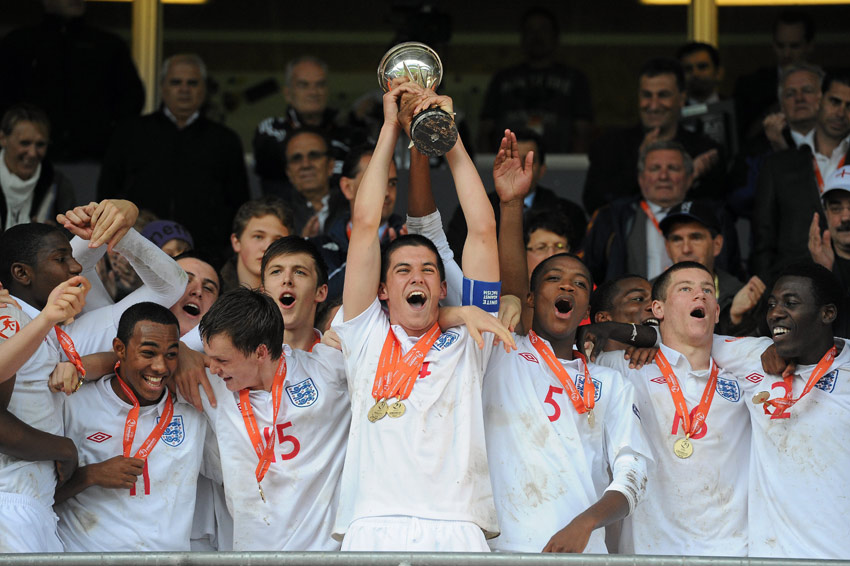 England captain Conor Coady holds aloft the UEFA European U17 Championship trophy.